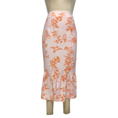 Ladies woven gathered skirt with full printing.