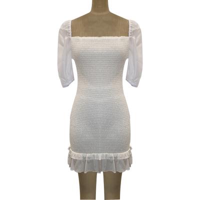 Women's smocked mini dress with ruffle hem